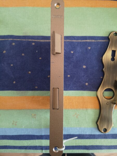 Maner si yala usa interior, Hoppe Munchen, cu slid pentru cheie, alama